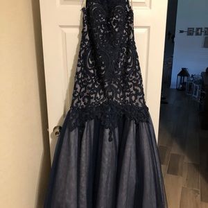 McQueen Dress never been altered or worn.